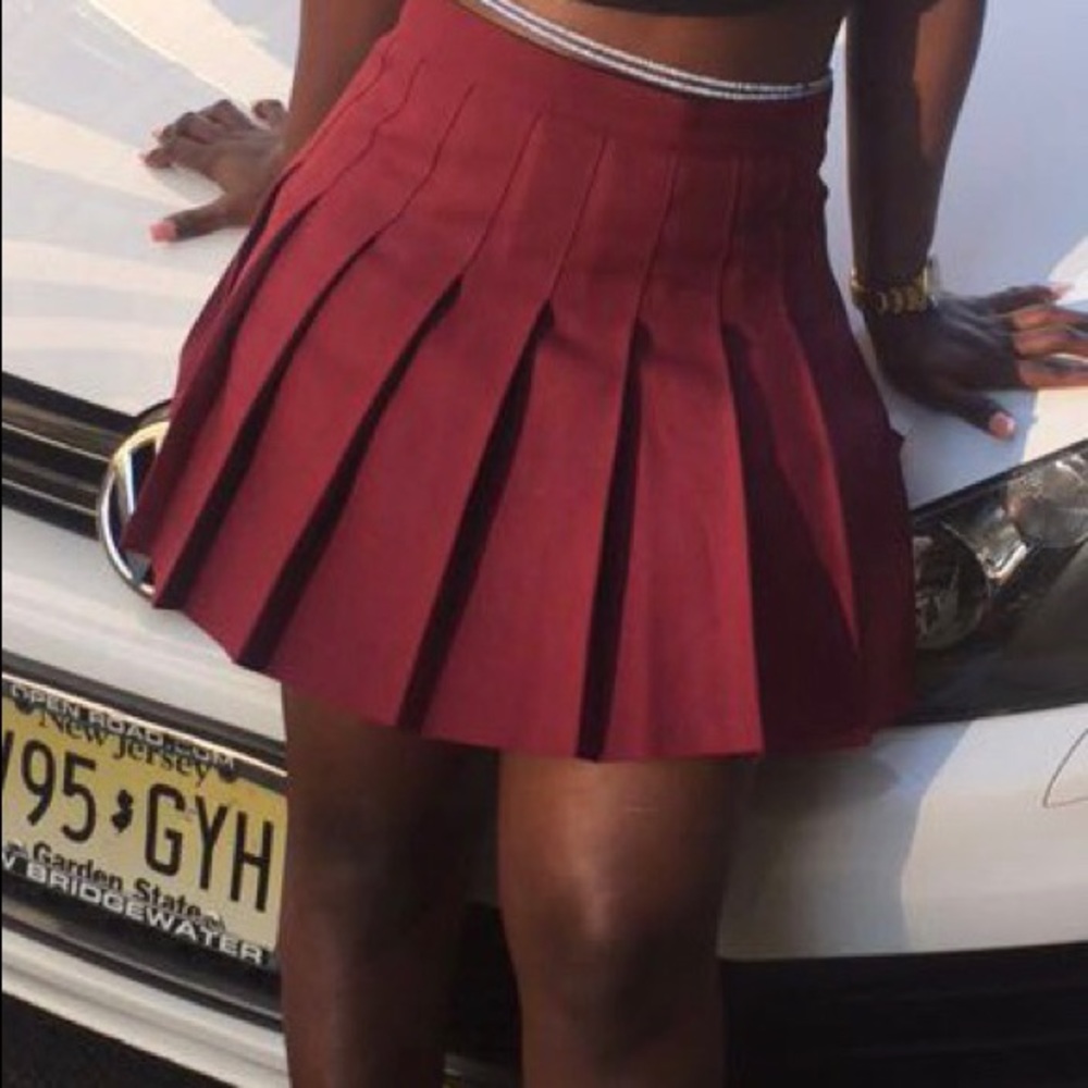 Burgundy skirt.
